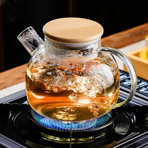 PRICES MAY VARY. 【Stovetop Safe】Our glass teapot are made of borosilicate lead-free glass, free of any metals and toxins. The glass tea kettle for stovetop can withstand temperatures from -68°F to 302°F, so the glass tea pot can be placed directly on stove top or electric stove. The glass tea kettle with infuser is stovetop-safe, microwave-safe and dishwasher-safe. 【Tight Sealing Bamboo Lid】The glass teapot for stovetop comes with a tight silicone reinforced bamboo lid, ensuring it is 100% airti Glass Tea Pot, Glass Tea Kettle, Tea Brewer, Sun Tea, Blooming Tea, Tea Reading, Tea Maker, Glass Teapot, Fruit Tea