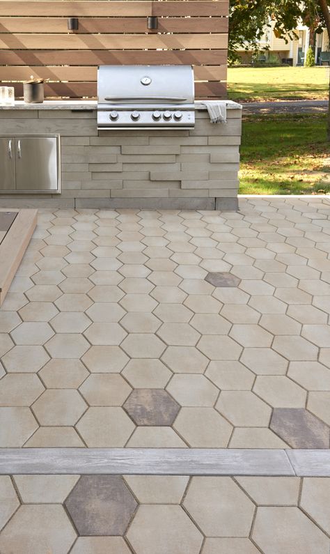 This backyard patio idea is inspired by our Hexa 60 patio slab. Inspired by the traditional hexagon paver, the Hexa 60 adds a modern twist to its predecessor. This patio slab is taking center stage in landscaping, providing a unique geometric look that blends seamlessly in modern outdoor spaces. From patios, to walkways and any other pedestrian-friendly environment, the Hexa 60 will add instant visual appeal to any exterior! Check out our website to shop the look! Hexagon Paver Patio Ideas, Hexagon Outdoor Pavers, Slabs Garden Patio, Hexagon Patio, Diy Stone Patio, Driveway Lights, Diy Concrete Patio, Backyard Goals, Patio Stone