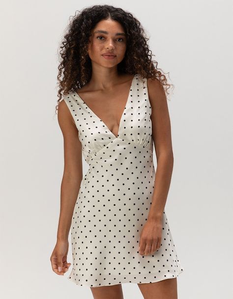 Cotton Candy La Polka Dot Slip Dress. A Classic V-Neck Slip Dress With An Allover Polka Dot Print. Straight Hem. Slip Lining. Approximate Length: 33". Shell: 100% Polyester. Lining: 95% Polyester 5% Spandex. Hand Wash. Imported. Model Is Wearing A Size Small. Model Measurements:height: 5'7" Bust: 32cwaist: 24"hips: 35" Silk Polka Dot Dress, V-neck Mini Dress In Polka Dot For Summer, Polka Dot V-neck Mini Dress For Summer, Polka Dot V-neck Dress For Brunch, V-neck Polka Dot Mini Dress For Summer, V-neck Polka Dot Dress For Brunch, Chic Polka Dot V-neck Dress, Sunday Brunch Dress, France Fits