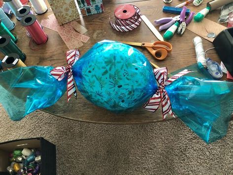 I Get Asked A Lot About What I Do When I Have To Wrap A Ball! (Sorry For Mess!) Wrapping A Ball, Ball Wrapping Gift, How To Wrap A Ball, How To Wrap A Ball Gift, Big Stuffed Animal, Pony Gift, Cling Wrap, Elephant Party, Fancy Bows