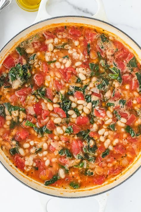 These Quick White Beans with Tomatoes & Kale are simple, delicious and comforting. Using canned beans makes this recipe easy and quick to cook for dinner. Roasted Tomatoes And White Bean Stew, Tomato White Bean Kale Soup, Canned Canelli Bean Recipes, Tomato Kale Soup, White Beans And Tomatoes Recipes, White Beans In Tomato Sauce, Kale Tomato Recipes, Cannellini Beans And Tomatoes, Kale And Tomato Recipes