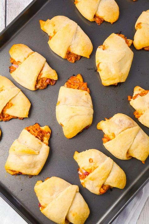 BBQ Chicken Crescent Rolls are an easy weeknight dinner recipe using shredded rotisserie chicken, diced red onions, Sweet Baby Ray's Barbecue sauce, shredded cheese and Pillsbury crescent rolls. Ham And Cheese Hot Pockets, Pillsbury Crescent Roll Recipes, Roll Dough Recipe, Crescent Roll Recipes Dinner, Pillsbury Crescent Rolls, Chicken Crescent Rolls, Shredded Rotisserie Chicken, Chicken Crescent, Pillsbury Crescent