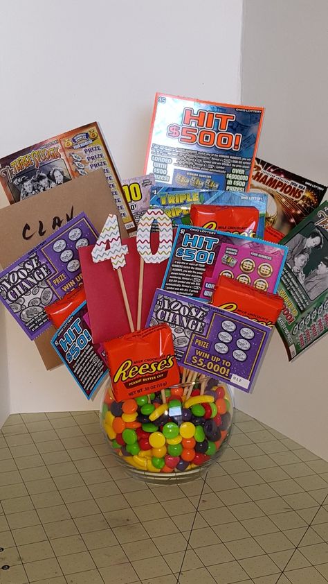 40th birthday bouquet for the Hubby.   Candy, pb cups, gift card and scratch offs. 40th Birthday Hamper Ideas For Him, 40th Birthday Lotto Basket, Scratch Off Bouquet, Gift Card Bouquet For Men, Lottery Ticket Bouquet, Teachers Birthday, Birthday Candy Bouquet, Mom Presents, Gift Card Bouquet