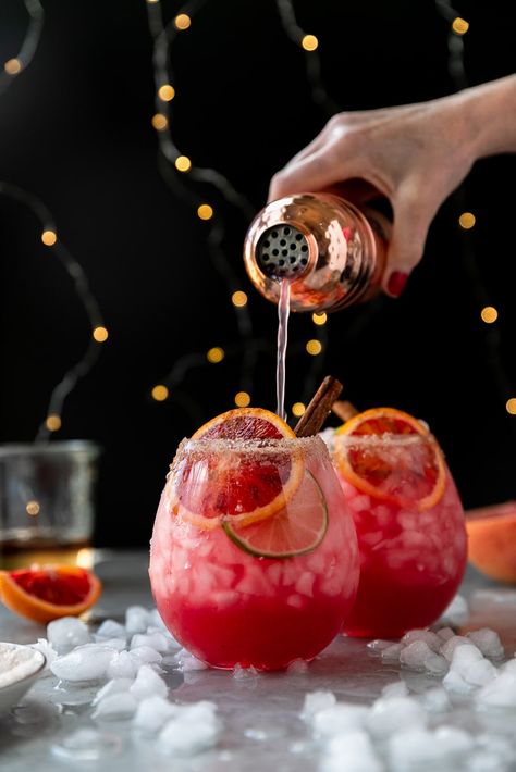 These Spiced Blood Orange Palomas are a refreshing, but still cozy holiday cocktail! The simple syrup is infused with star anise and cinnamon, and the palomas are filled with tequila, fresh blood orange juice, grapefruit juice, lime juice, and a little soda water for some bubbles! For a little extra spice, the rim is made with margarita salt, sugar, cinnamon, allspice, and cloves! #paloma #cocktail #bloodorange #tequila #festive Blood Orange Cocktail, Margarita Salt, Vodka Lime, Paloma Cocktail, Pretty Cocktails, Blood Orange Juice, Drink Recipes Nonalcoholic, Festive Cocktails, Soda Water