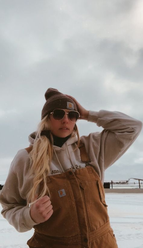 Carhartt beanie Carhartt coveralls Farm Fashion American Bonfire Sunglasses Western Aesthetic Western Wear Cowgirl Aesthetic Western Lifestyle Farm Girl Coverall Outfit Women Winter, Fall Carhartt Outfit, Woman Carhartt Outfits, Carrhartt Girl, Country Farm Outfits, Carhartt Woman Outfit, Carhartt Bibs Outfit Women, Cute Carhartt Outfits, Carhartt Overalls Outfit Winter