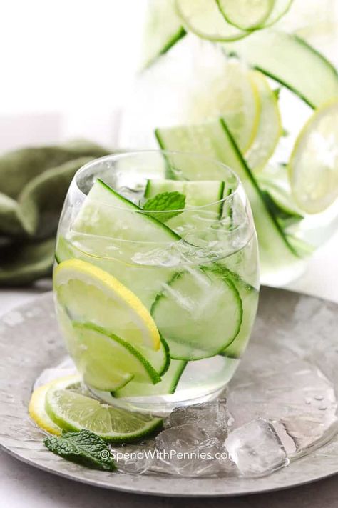 This cucumber water recipe is infused with flavors like lemon, mint & lime! We love serving this refreshing water at parties, or even just in our water bottle while running errands! You won't have to worry about getting enough to drink with this irresistible  combination!  #spendwithpennies #cucumberwater #fruitinfusedwater #beverages #flavoredwater Melon Sangria, Cucumber Water Recipe, Cucumber Lemon Water, White Wine Sangria, Mint Water, Creamy Cucumber Salad, 95 Percent, Cucumber Water, Creamy Cucumbers