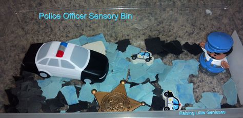 Policeman Sensory Bin. Use this sensory bin as part of a Community Helpers Theme. Expand vocabulary by talking about the different things in the bin Police Officer Sensory Bin, Police Sensory Activities, Police Sensory Bin, Community Helpers Lesson Plan, Community Helpers Week, November Themes, Community Helper Lesson, Community Helpers Crafts, Expand Vocabulary