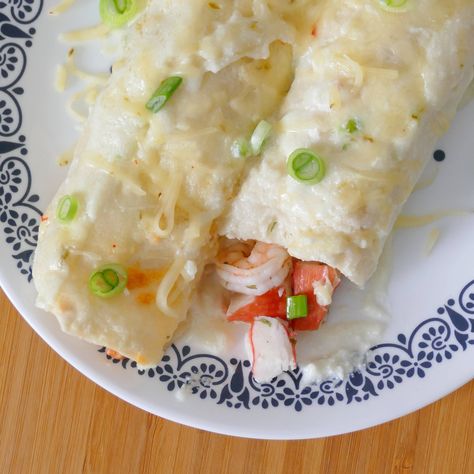 Shrimp and Crab Seafood Enchiladas with Jalapeno Cream Sauce Enchiladas With White Queso, Shrimp And Crab Enchiladas, Jalapeno Cream Sauce Recipe, Crab Enchiladas, Jalapeno Cream Sauce, Seafood Enchiladas Recipe, White Sauce Enchiladas, Seafood Enchiladas, Shrimp Enchiladas