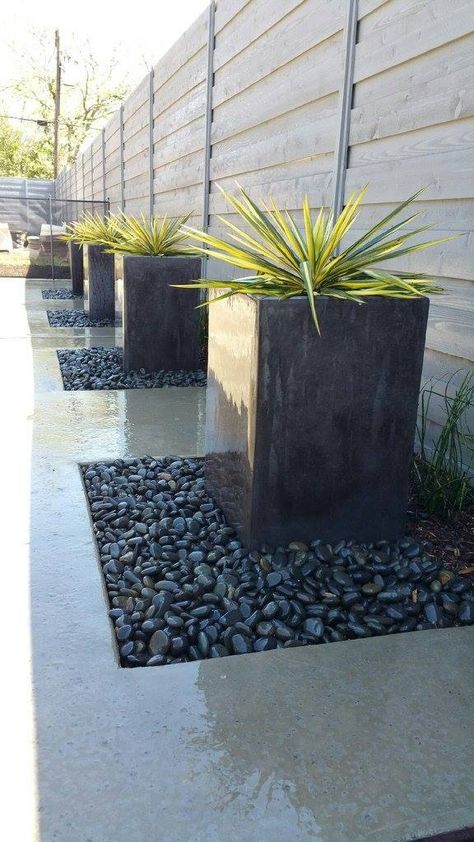 Minimal Outdoor Landscaping, Mexican River Rock, Front Yard Landscaping Modern Design, Driveway Rock Landscaping, Black Stone Landscaping Modern, Planters In Rock Beds, Flower Beds In Front Of House Modern, Modern Flowerbed Ideas, Modern Flower Bed Ideas