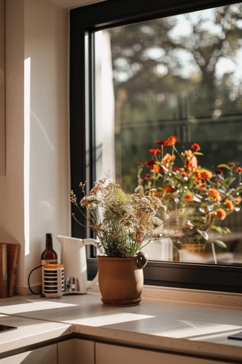 Looking to refresh your kitchen? Check out these charming kitchen window decorating ideas! From dreamy curtains to vibrant plant displays, you’ll find something fun to spice up your cooking space without breaking the bank. Discover how budget-friendly changes like colorful window treatments and clever decor can transform your window into a delightful focal point. Perfect for small spaces, these fresh design ideas will enhance functionality and style while reflecting your personality. Get inspired to brighten your kitchen today! Kitchen Picture Window, Dreamy Curtains, Modern Kitchen Window Treatments, Kitchen Window Sill Ideas, Window Sill Ideas, Window Decorating Ideas, Kitchen Window Decor Ideas, Window Decor Ideas, Modern Bachelor Pad