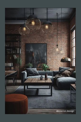 If you like your homes to be more moody, this living room can serve as perfect inspiration for you as you refresh your home and pick home accents. From gray living room furniture to exposed brick walls, we love the way each accent in this space feels purposefully selected. Gray Brick Wall, Brick Living Room, Industrial Style Living Room, Industrial Living Room, Casa Loft, Loft Stil, Casa Country, Black Living Room, Industrial Living