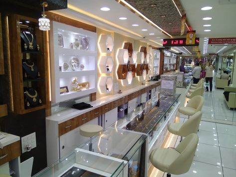 Jewellery Showroom Interior Design, Watch Showcase, Interior Showroom, Jewelry Store Interior, Jewelry Store Displays, New Ceiling Design, The Architects Diary, Retail Store Interior Design, Clothing Store Design