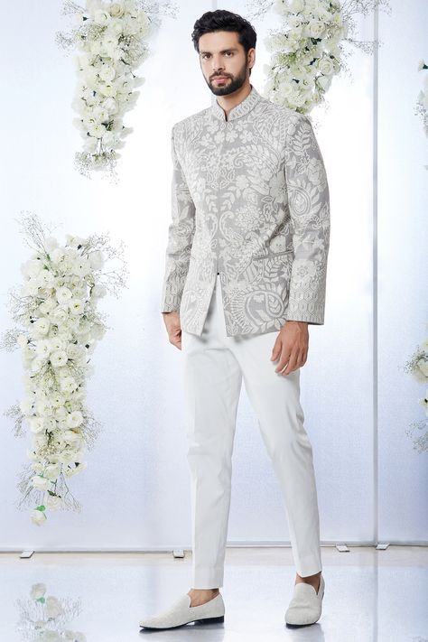 Featuring a grey bandhgala jacket in raw silk base with sequins embroidery. It is paired with a contrasting off white shirt in giza cotton base and cotton pants.  FIT: True to size. COMPOSITION: Raw silk, Giza cotton, Cotton. CARE: Dry clean only. Engagement Outfits Indian, Reception Dress For Men, Engagement Dress For Men, Reception Suits, Engagement Board, Indian Wedding Suits Men, Suit For Men Wedding, Seema Gujral, Guy Outfits