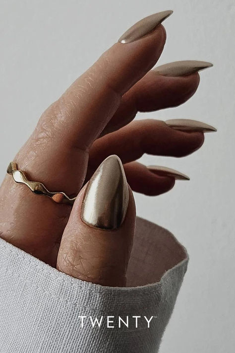 A close up of a hand with almond shaped nails with rose gold chrome nail art. Mirror Nail Polish, Gold Chrome Nails, Gel Polish Nail Designs, Rose Gold Chrome, Milky Nails, Chrome Nail Powder, Chrome Nails Designs, Gold Nail Designs, Cat Eye Gel Polish