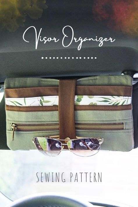 Car Visor Organizer sewing pattern. With this Car Visor Organizer sewing pattern, you can keep your car tidy and organized, while at the same time always having what you need on hand. This Visor Organizer has been made as a convenient place to stash fuel cards, chapstick, important paperwork, etc with a zippered pocket for tokens, coins, and all other small bits and pieces that need safe storage. SewModernBags Car Visor Organizer, Visor Organizer, Wallet Sewing Pattern, Purse Sewing Patterns, Car Trunk Organization, Car Visor, Modern Bag, Car Organizer, Trunk Organization