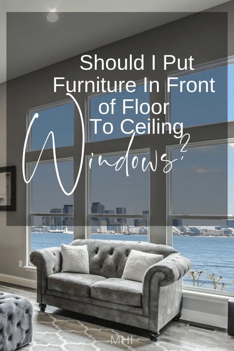 I’ve learned, sometimes the best place for furniture is in front of a window.  And I think that this might be even more imperative when you have floor to ceiling windows, especially if they go around the space.  To help you decide, here are 5 key points to consider when deciding, “Should I put furniture in front of floor to ceiling windows? Picture Window Furniture Layout, Furniture Placement In Front Of Windows, Sofa In Front Of Large Window, Studio Apartment Floor To Ceiling Windows, Placing Furniture In Front Of Windows, Full Wall Windows Living Rooms, Living Room With Floor To Ceiling Window, Apartment With Floor To Ceiling Windows, Floor Windows Living Room