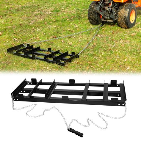 PRICES MAY VARY. Maintain Your Driveway Like a Pro: Effortlessly smooth out gravel, dirt, and other driveway materials for a pristine, polished look with these driveway grader tractor implements Versatile Leveling Power: Driveway drag perfect for driveways, yards, fields, and more. Easily attaches to ATVs, UTVs, lawn tractors, and even trucks. Can be expanded up to 96 inches (8 feet) with the included expansion brackets and an additional 4 foot section - sold separately Heavyweight Yard Drag Bui Lawn Tractor Attachments, Driveway Materials, Iron Forge, Riding Mower Attachments, Diy Tools Homemade, Lawn Tractors, Tractor Implements, Tractor Attachments, Tool Stand