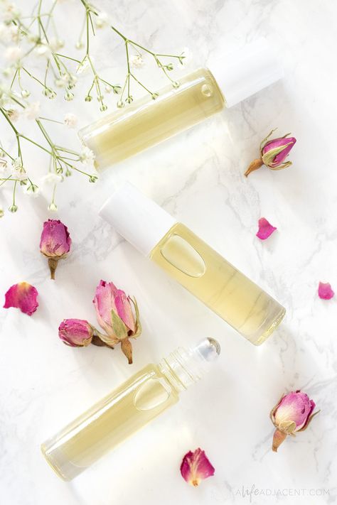 This DIY cuticle oil recipe is the best homemade remedy for brittle nails and dry cuticles! It’s so easy to make and will save you so much money on store bought cuticle oil. This nail oil moisturizes, prevents hangnails, and helps promote nail growth. Simply place your ingredients into a rollerball bottle and roll onto nails. Learn how to make make your own nourishing nail oil at home. #naildiy #alifeadjacent #nailcare Homemade Cuticle Oil, Cuticle Oil Recipe, Empty Nail Polish Bottles, Nail Care Diy, Perfume Quotes, Dry Cuticles, Perfume Genius, Nail Problems, Diy Nail Polish