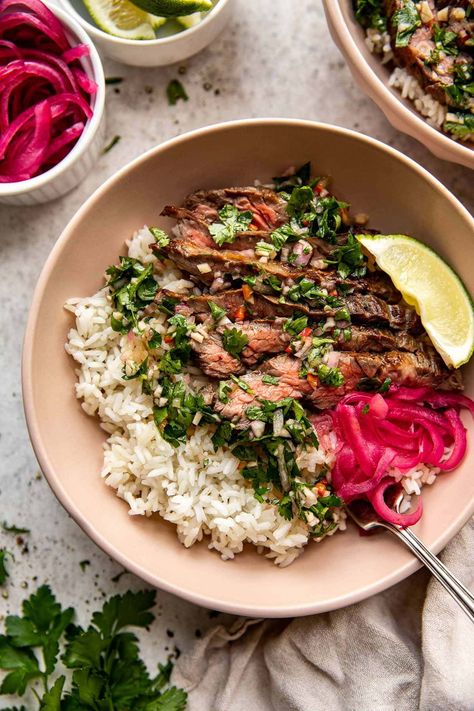 Skirt Steak Rice Bowls with Chimichurri Sauce - Well Seasoned Studio Cilantro Chimichurri Sauce, Steak Rice, Cilantro Chimichurri, Skirt Steak Recipes, Steak And Rice, Fluffy Rice, Rice Bowls Recipes, Cooking White Rice, Chimichurri Sauce