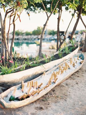 Champagne Presentation, Haiti Wedding, Drink Canoe Wedding, Canoe Bar, Canoe Cooler, Tropical Beach Ceremony, Tropical Wedding Lighting, Wedding Canoe, Tropical Wedding Theme Seating Chart