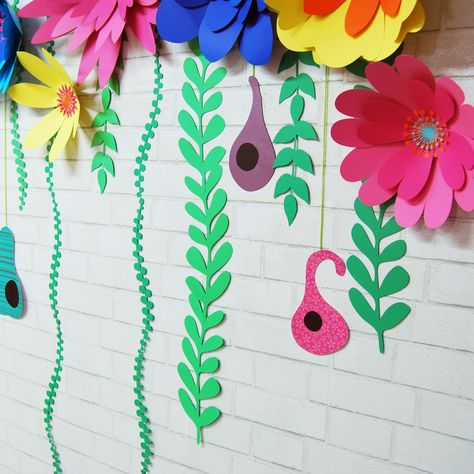 Big 3D flowers in bright colors, with gourds and vines, makes a beautiful backdrop for photos and is perfect for a Trolls themed party, or even a whimsical fairy themed party. Each order comes 8 flowers in a variety of bright colors, and a mix of colored gourds and green vines. Each element is separate so that in can be hung to suit your needs: 8 flowers, 9 vines, 3 gourds Looking for other birthday party supplies or themed party decorations? Let Party At Your Door create a custom party in a box Vine Backdrop, Troll Party Theme, Fairy Theme Party, Preschool Decor, Trolls Party, Trolls Birthday Party, Troll Party, Party In A Box, 3d Flowers