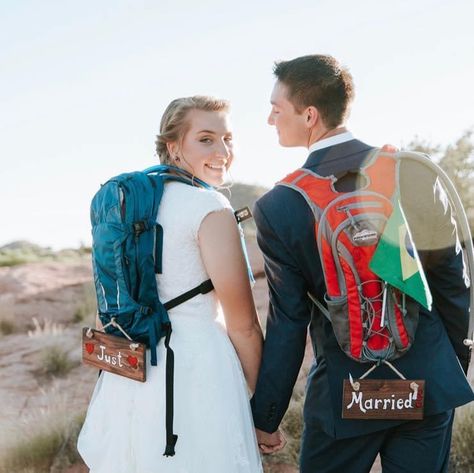 My daughter and newest son in law love the outdoors. We had the idea to make cute "Just Married" signs to hang from their hydration packs. And then get a photo of them with their packs while still in their wedding attire. Turned out pretty cute.   Wedding photos, backpacking, hiking, Climbing Wedding, Cute Wedding Photos, Wedding Photo Idea, Backpacking Hiking, Cute Wedding, Son In Law, Photo Idea, Pretty And Cute, Just Married