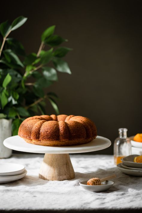 Orange Bundt Cake made with rich nutty browned butter and honey. A light textured orange bundt cake with warm spices and hints of honey. Perfect breakfast cake or drizzle with orange glaze! #orangecake #brownbuttercake #buttercakerecipe #honeycake #twocupsflour Orange Honey Cake, Orange Glaze Cake, Brown Butter Cake, Summer Baking Recipes, Orange Bundt Cake, Orange Honey, Glaze For Cake, Cake Stand With Dome, Butter Cake Recipe