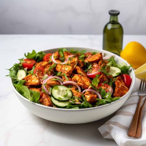 This Easy Healthy Low Cal Chicken Tikka Salad is perfect for a hearty meal by itself. It features marinated and grilled chicken tikka tossed with some crunchy veggies and topped with a fresh mint and yogurt chutney dressing Salads usually are a perfect side to the main course, and some salads are as good and... Read More The post Easy Healthy Low Cal Chicken Tikka Salad  appeared first on Bake with Sweetspot. Chicken Tikka Salad Recipe, Chicken Tikka Salad, Chicken Tikka Marinade, Vegetable Masala, Malai Chicken, Kung Pao Chicken Recipe, Tikka Recipe, Chicken Masala, Roasted Brussel