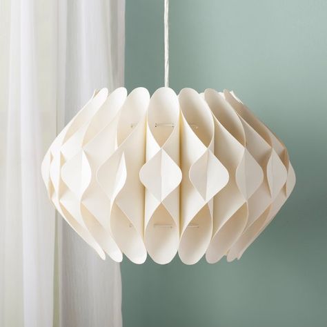 Bring a boost of brightness and a bit of boldness to any arrangement with this one-light geometric pendant. As much an art piece as it is a source of light, this fixture features an origami-inspired shade with overlapping tubes and a row of folds along the center. A single 100 W medium-base bulb (not included) sits within to cast a warm glow over your space. Though its design is distinctive, this piece’s neutral beige tone ensures it’s versatile enough to blend with any color palette you pick. Puzzle Lights, Origami Home Decor, Origami Lampshade, Diy Pendant Light, Origami Lamp, Plug In Pendant Light, Paper Light, Contemporary Pendant Lights, Modern Dollhouse