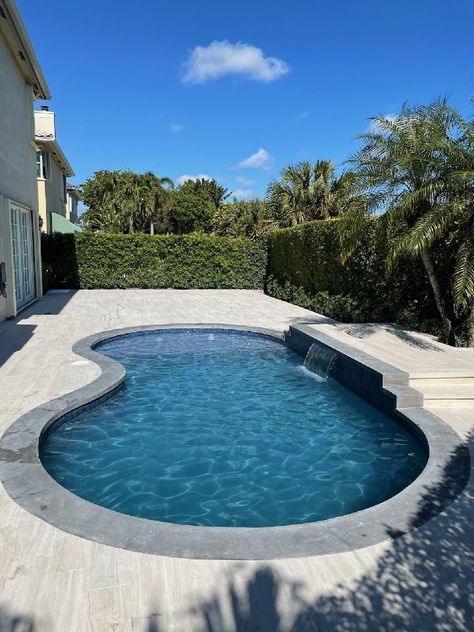 Paver Pool Coping, Dark Coping Around Pool, Concrete Coping Around Pool, Curved Pool Coping, Pool Concrete Deck Ideas, Pool Resurfacing Ideas, Concrete Around Pool Ideas, Small Backyard Pool Landscaping, Pool Coping And Tile