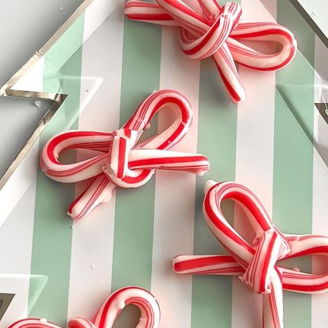 Allison Joy on Instagram: "Candy cane bows 🎀 anything else we can make a bow this season?! Place these on parchment paper on a baking sheet and put in the oven on the lowest setting for 10 min. It will make them just pliable enough to bend into a bow shape." Candy Cane Bows, Candy Cane Bows In Oven, Make A Bow, Parchment Paper, Baking Sheet, Christmas Candy, How To Make Bows, The Oven, Candy Cane