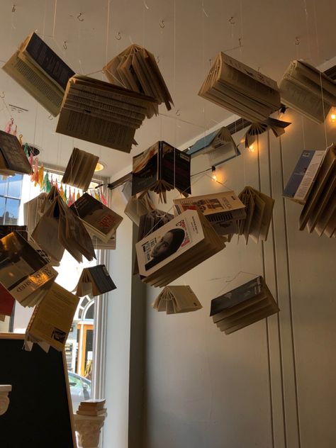 Book Ceiling Decor, Books On Ceiling, Centenary Celebration Ideas, Diy Giant Book, Books Hanging From Ceiling, Book Chandelier, Library Decorating Ideas, Hanging Books, Hanging Library