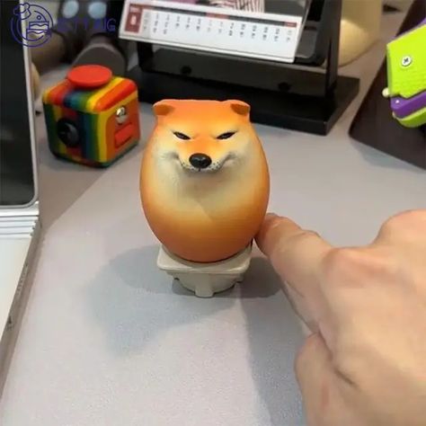 🥚🐕 Introducing Our Adorable Shiba Inu Realistic Egg Shape Toy! 🐕🥚 Looking for the perfect addition to your desk or home decor? Look no further than our Shiba Inu Realistic Egg Shape Toy! Crafted with exquisite attention to detail, this adorable toy perfectly captures the charm of the beloved Shiba Inu breed in a unique egg-shaped design. Whether you're a dog lover or simply appreciate cute and quirky decor, this toy is sure to bring a smile to your face every time you see it. Not only is o... Trendy Toys, Funny Expressions, Shiba Inu Dog, Sand Sculptures, Decorations For Home, Dog Christmas Gifts, Cool Office, Home Offices, Decor Figurines