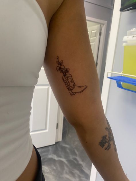 Red Cowgirl Boot Tattoo, Country Line Dancing Tattoo, Savannah Georgia Tattoo, Floral Cowboy Boot Tattoo, Western Fine Line Tattoo Ideas, Flower Western Tattoo, Cowboy Themed Tattoo, Fine Line Cowboy Boot Tattoo, Cowboy Boot With Flowers Tattoo