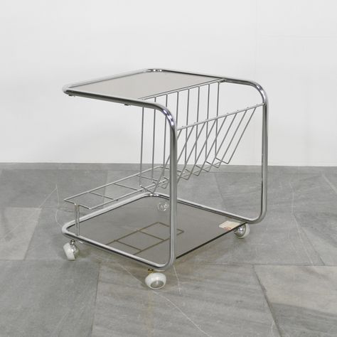 Vintage West German Smoked Glass & Tubular Chromed Steel Huwa-Spiegel Parsol Rectangular Side Table. Available. #ArtDeco  #magazinerack #bauhaus #artdecointerior #homedecor #spaceageinteriors  #vintagehome #vintagefurniture #vintagefurnitureforsale #streamlinefurniture #minibar  #vintagebookshelf #modernistfurniture #modernisthome #modernism #frenchmodernism #brutalistinterior #bauhausinterior #homeofficeinspo #homeinspo #livingroominspo #livingroomdesign #interiordesign #interiorstyle #NewD... Bauhaus Interior, Rectangular Side Table, Mini Bars, Art Deco Interior, Modernism, Vintage Furniture, Vintage House, Home Office, Side Table