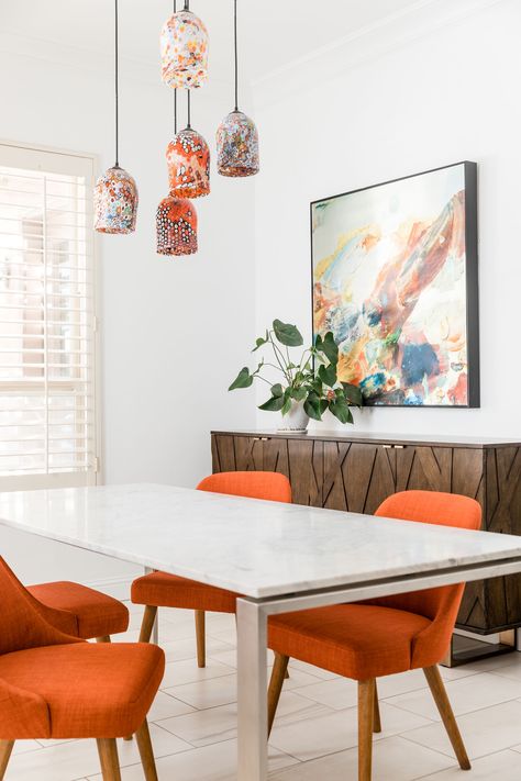 Dining rooms with orange accents - upholstered chairs & blown glass lighting by PepperJack Interiors - Lookbook - Dering Hall Desine Room, Orange Accents Living Room, Dining Room Orange, Room Desine, Orange Dining Room Chairs, Orange Dining Room, Orange Dining Chairs, Blown Glass Lighting, Dining Room Accents