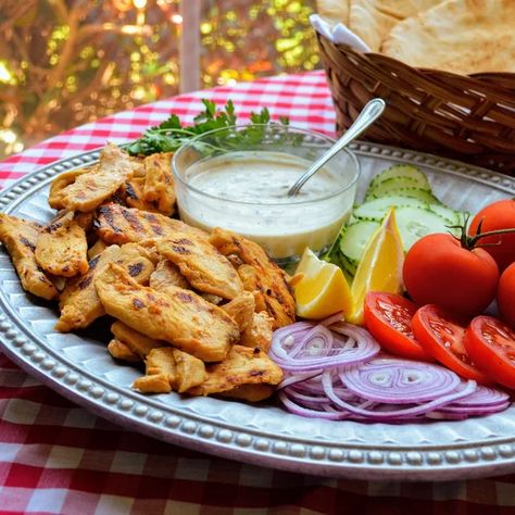 Yogurt-Marinated Chicken Shawarma Recipe | Allrecipes Yogurt Marinated Chicken, Yogurt Marinade, Chicken Shawarma Recipe, Shawarma Recipe, Pan Fried Chicken, Chicken Shawarma, Yogurt Sauce, All Recipes, Pita Bread