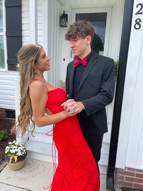 Tux With Red Dress Prom, Prom Couples Red Dress, Red And Black Prom Couples Outfit, Red Prom Dress Pictures With Date, Red Prom Dress Couple Pictures, Red Prom Dress Pictures, Red Prom Dress And Date, Red Prom Pictures, Red Dress And Suit Couple