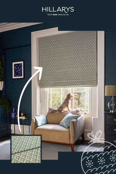 A dark blue living room with a large window fitted with a geometric print Roman blind. There is a neutral armchair below the window and a dog sat on the back cushion looking out of the window. Blind Living Room, Roman Blinds Living Room, Dark Blue Walls, Christmas Interiors, Wall Drawing, Beautiful Windows, Geometric Fabric, Roman Blind, Roman Blinds