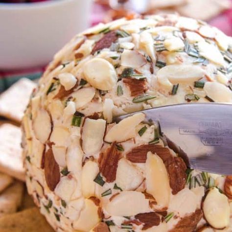 This Swiss Almond Cheeseball makes the PERFECT holiday appetizer! Because no holiday celebration is complete without a cheeseball....(am I right?)....and this Swiss Almond combo is to die for! If you've never tried it, now is the perfect time to try it and fall in love. All you need is a handful of ingredients, a few minutes of mixing, and some time to chill....and you have yourself a new party appetizer that's guaranteed to become a fast favorite! I partnered with Pick 'n Save to... Hickory Farms Cheese Ball Recipe, Swiss Cheese Ball Recipe, Almond Cheese Ball, Almond Cheese, Lemon Tree Dwelling, Farm Cheese, Hickory Farms, Swiss Recipes, Holiday Cheese