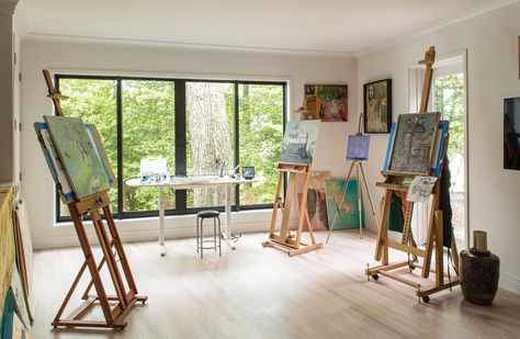 Large windows and skylights bathe the owner’s art studio with plenty of natural light. Art Studio With Windows, Art Studio Windows, Art Studio Business, Artist Studio Space, Studio Building, House Vision Board, Art Loft, Tools Art, Art Studio Space