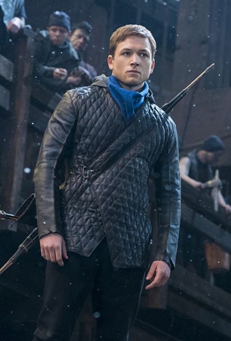 A new trailer for the upcoming Robin Hood film has just been released with Taron Egerton starring as Sherwood Forest’s arrow-carrying vigilante. And while many of us are still wondering why we need a new adaptation of the story, we make the trailer Lionsgate’s Robin Hood one to keep an eye on. Taron Egerton Kingsman, Leather Jacket Hoodie, Hood Wallpapers, Quilted Leather Jacket, Black Leather Coat, Taron Egerton, Famous Movies, Jackets Men Fashion, Robin Hood