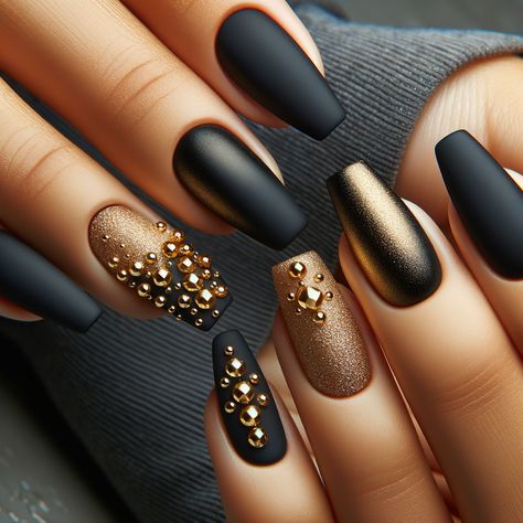 Close-up view of stylish matte black nails embellished with gold studs, showcasing a trendy and elegant nail art design. Gold Matte Nails, Gold And Black Nails Acrylics, Matte Black Nails With Gold, Black Nails With Gold, Copper Nails Designs, Black Christmas Nails, Nails For 2023, Gold Gel Nails, Black Gold Nails