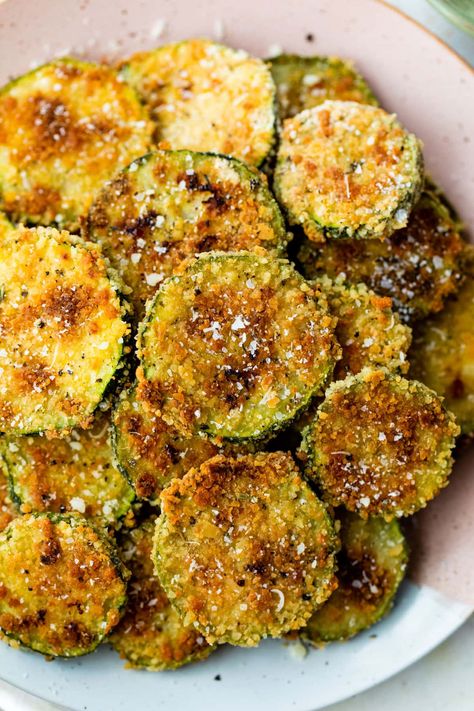 Cheesy, crispy oven-baked zucchini chips are the best way to eat your veggies! They're easy to make and impossible to resist. Zucchini Chips Recipe, Zucchini Recipes Baked, Gluten Free Panko, Holiday Meal Planning, Zucchini Chips Baked, Baked Zucchini, Salmon And Shrimp, Bake Zucchini, Slow Cooker Pasta