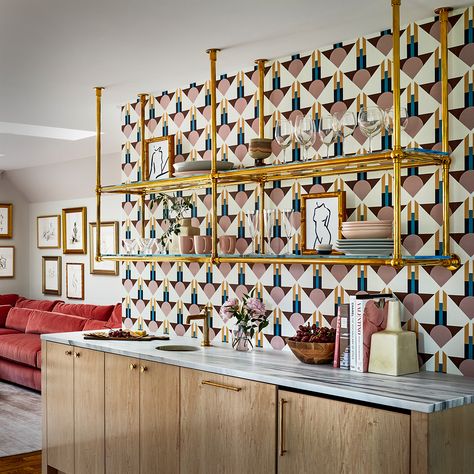 A ceiling and wall mounted Ball style bistro shelving system configured with front and rear vertical posts as well as front and rear horizontal cross bars on both shelf levels. Finished in polished brass unlacquered. Designer: Zoe Feldman Design – Photography: Stacy Zarin Goldberg | sinklegs Bistro Shelving, Brass Shelving, Ceiling Shelves, Vanity Shelves, Shelf System, Studio Kitchen, Shelving Racks, Wet Bars, Shelving Systems