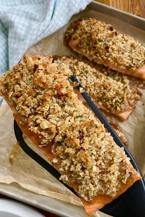 Pecan Crusted Honey Mustard Salmon is an easy seafood entrée that will have dinner on the table in less than 30 minutes. This delicious baked salmon recipe includes sweet spicy honey mustard glazed fillets with a crunchy pecan panko topping. #fishrecipes #salmonrecipesbaked #salmonrecipes Honey Dijon Pecan Crusted Salmon, Honey Pecan Salmon, Pecan Salmon Recipes, Pecan Crusted Salmon, Breaded Salmon, Salmon Recipes Oven, Salmon Fillet Recipes, Honey Mustard Salmon, Honey Glazed Salmon