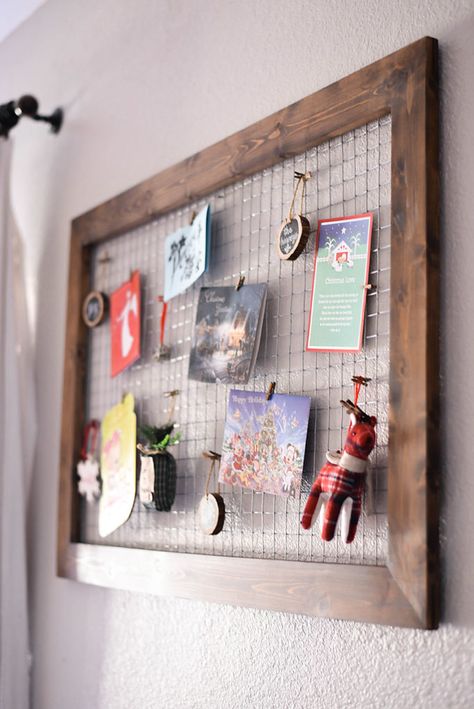 DIY Wood and Chicken Wire Christmas Card Holder | Our Handcrafted Life    This super versatile DIY project that could be really used throughout the year, but around the holidays I love to use it as a DIY Chicken Wire Christmas Card Holder. This Christmas card display allows all those Holiday cards to be wall decor instead of sitting in a pile. Hand ornaments, pictures, kid's art, and cards on this framed chicken wire piece that's part wall art and part organization. Farmhouse Kids Art Display, Chicken Wire Photo Display, Diy Picture Holder, Picture Holder Diy, Farmhouse Christmas Decor Diy, Diy Chicken Wire Frame, Hanging Kids Artwork, Diy Wood Picture, Wood Picture Holder