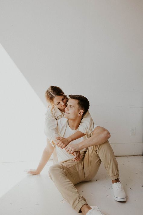 Board Game Couple Photoshoot, White Studio Couple Photoshoot, Intimate Studio Photoshoot, In Studio Couples Session, Couples Neutral Outfits, Husband And Wife Studio Photoshoot, Engagement Photos Indoor Studio, White Sheet Photoshoot Couples, Studio Session Couple