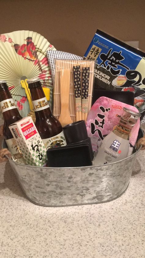 #Sushi #sake #giftbasket Asian Gift Basket, Ramen Gift Basket Ideas, Asian Gift Basket Ideas, Sushi Gift Ideas, Ramen Gift Basket, Sushi Gift Basket, Anime Gift Basket, Cooking Gifts Basket, Ramen Gifts