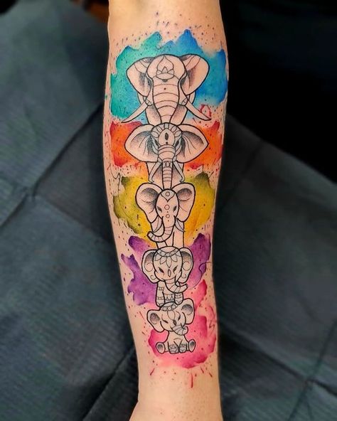 17 Elephant Tattoo Ideas for Women: Graceful and Empowering Designs Lion Elephant Tattoo For Women, Elephant And Dream Catcher Tattoo, Elephant And Ladybug Tattoo, Elephant Family Tattoos For Women, Mama And Baby Elephant Tattoo, Tattoo Ideas Female Elephant, Elephant Tattoo Ideas, Colorful Elephant Tattoo, Matching Family Tattoos